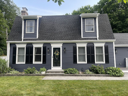 dark grey vinyl siding with black window panels
